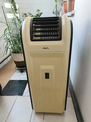 Vând aer conditionat, portabil - marca AUX - folosit.