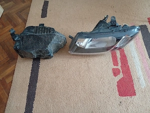 Far stânga și carcasă filtru aer Dacia Logan II
