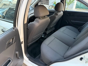 Chevrolet Aveo 1.2 Benzină   70.000 KM REALI   AC   CarVertical Verde   Fără Daune - imagine 7