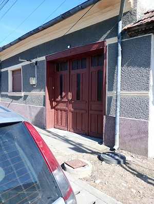 Casă de vânzare în Ciclova Română   locuință confortabilă având curte și grădină