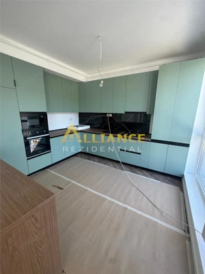 Apartament 2 camere tip Studio + 75 mp curte proprie - imagine 2