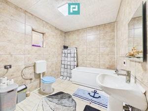 Casă P+E cu două apartamente, zona Drăgășani - imagine 8