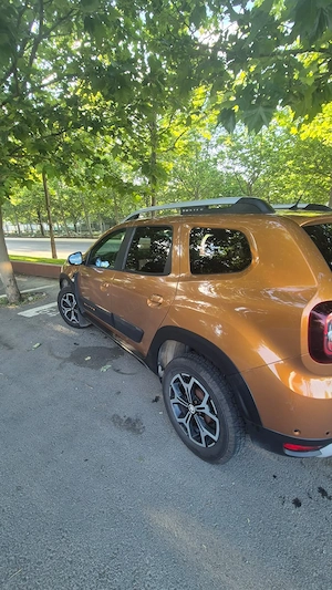 Dacia Duster 1.5 Blue DCI 4x4 140 cp Prestige 17" - imagine 10