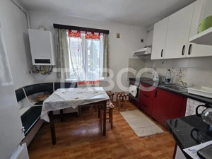 Apartament decomandat 3 camere 2 bai 66 mp parcare boxa Terezian Sibiu - imagine 7