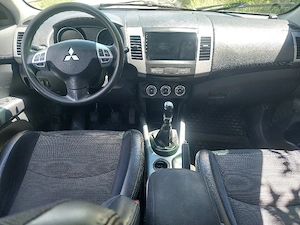 Mitsubishi Outlander 2011 2.2 177 de cai - imagine 3