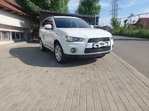 Mitsubishi Outlander 2011 2.2 177 de cai - imagine 7