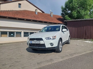 Mitsubishi Outlander 2011 2.2 177 de cai - imagine 5