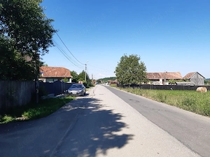Vand teren intravilan construibil utilitati drum asfaltat pozitionare buna central  Lunca Calnicului