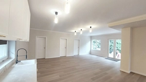 Casa la cheie cu 3 camere 2 băi living+ bucatarie open space 110 mp utili  - imagine 2