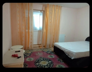 Apartament cu gradina de inchiriat