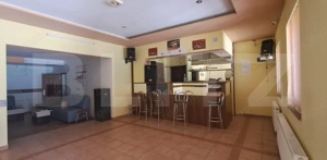 Magazin sătesc cu terasă, centrul satului Feldioara– priveliște Munții Făgăraș