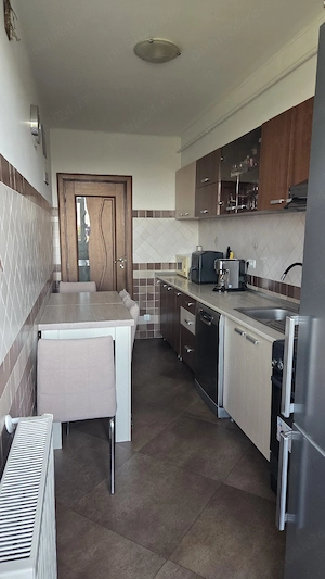 Apartament complet mobilat si utilat ,bloc nou,doua camere,doua balcoane, doua debarele,etaj 3 din 4 - imagine 4
