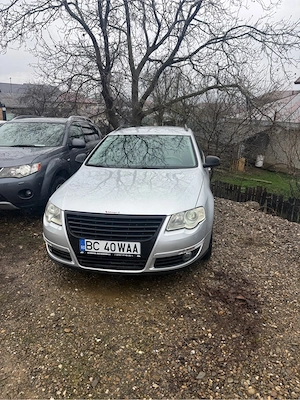 Volkswagen Passat 1.9 TDI an 2009  - imagine 5