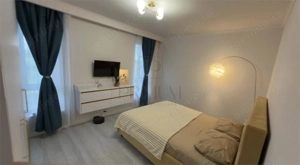 GIROC - 2 CAMERE - ETAJUL 1 - MOBIALT SI UTILAT - SUPERB - imagine 3