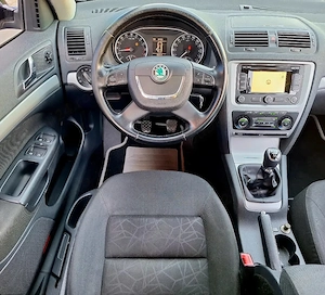 Skoda octavia 1.6 tdi 110 cai euro 5 ,navi,clima,pilot,incalzire scaune 220.000 km Import Germania  - imagine 3
