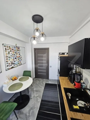 Apartament 2 camere decomandat, terasa 27 mp, 2 parcari, zona Terra - imagine 4