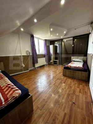 Două camere într-o casă de inchiriat, cu acces la bucătărie și baie  - imagine 3