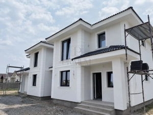 Duplex despartit prin C.T. - bucatarie inchisa - 130 mp utili - imagine 2