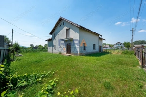 Casă din 2010 (3 dormitoare, două băi și garaj)