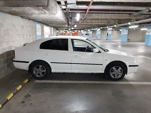 Skoda Octavia Tour 1.6 MPI Benzină   istoric complet, km reali, primul proprietar - imagine 9