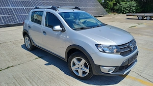 Dacia sandero 0.9 benzina 90 de cai ,euro 5 ,aer,navi,pilot,Unic propr ,205.000 km Import Germania  - imagine 2