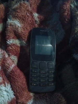Vând telefon Nokia cu butoane gri 