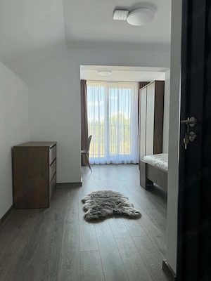 Camere cu băi private și apartament de închiriat în 7 Noiembrie, la 10 minute de UMF