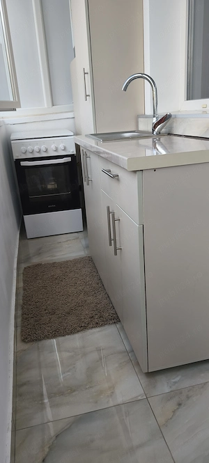 De închiriat două camere, renovat recent, mobilat, centrală, aproape de Piața Centrală, tramvai - imagine 9