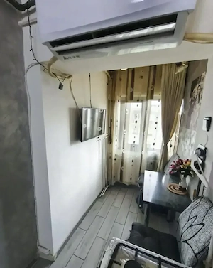 Garsonieră  decomandată  renovată complect (mobilată+utilată )  9 mai