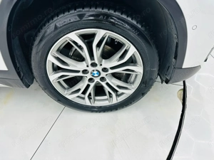 Bmw Seria X - imagine 8
