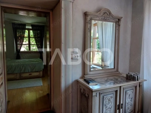 Casa saseasca P+1E+M 216 mpu curte libera 175 mp Cisnadioara - imagine 14
