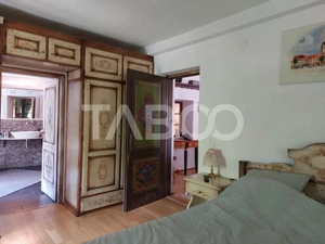 Casa saseasca P+1E+M 216 mpu curte libera 175 mp Cisnadioara - imagine 12