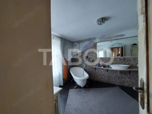 Casa saseasca P+1E+M 216 mpu curte libera 175 mp Cisnadioara - imagine 9