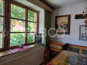 Casa saseasca P+1E+M 216 mpu curte libera 175 mp Cisnadioara - imagine 20