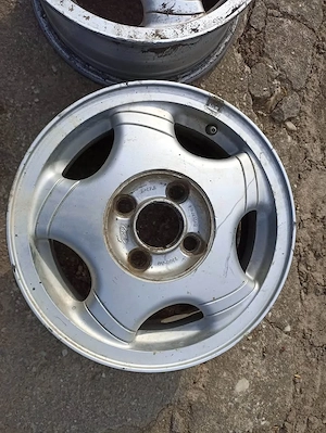 Set jante aliaj 14 inch Ford, originale! Jantele sunt de pe un Ford Escort din 1997 - imagine 9