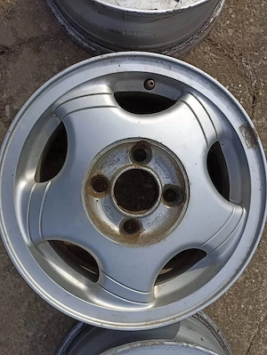 Set jante aliaj 14 inch Ford, originale! Jantele sunt de pe un Ford Escort din 1997 - imagine 7