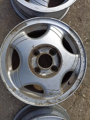 Set jante aliaj 14 inch Ford, originale! Jantele sunt de pe un Ford Escort din 1997 - imagine 8