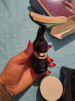 Aparat de masaj facial   