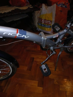 Vand bicicleta pliabila folosita putin Adusa din Anglia 