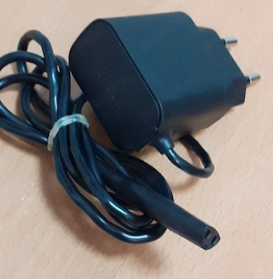 Alimentator BRAUN 12V și 400mA,pentru parate de ras,trimmere,mașini de tuns și epilatoare. 