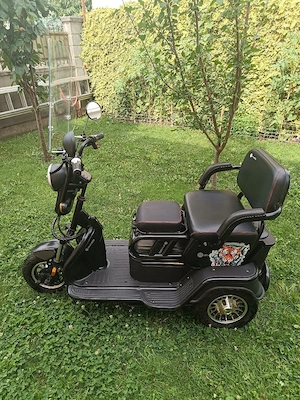 Vând tricicleta electric  