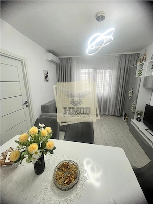 Apartament 2 camere | Renovat | Balcon inchis | zona Rahovei - imagine 2