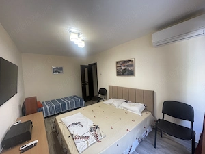 Garsonieră spațioasă, cu dotări pentru un sejur confortabil - imagine 4