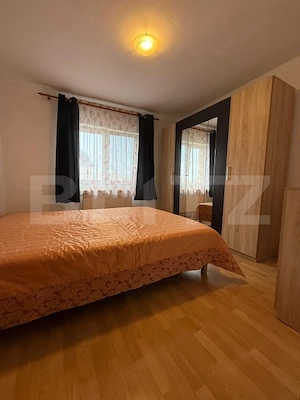 Apartament de vanzare 3 camere, 2 bai, decomandat, Tractorul, 2 locuri parcare