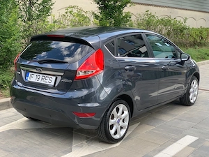 Ford Fiesta Ghia 2009 1.4 Diesel 85 CP - imagine 4