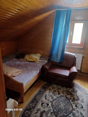 vând casă din lemn (cabană)izolată cu teren aferent - imagine 12