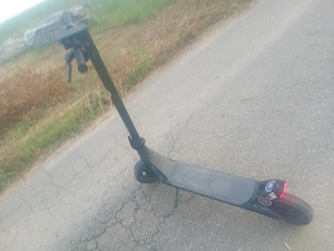 trotineta electrica Xiaomi pro motor pe spate până pe spate 