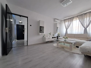 Apartament cu 3 camere-complet renovat-mobilat si utilat- Judetean