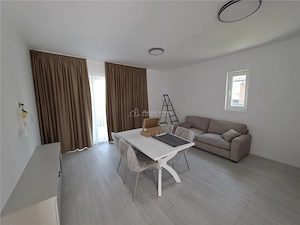 Casa parter - Tunari - 3 camere - 2 bai - 102 mp - prima inchiriere