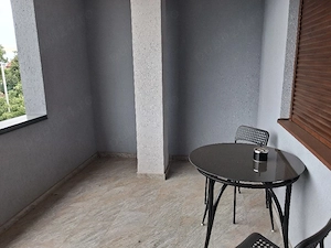 închiriez apartament o camera - imagine 6
